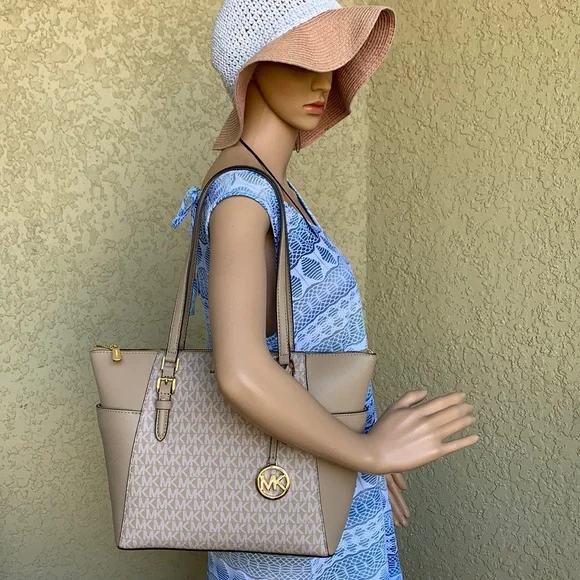 MICHAEL KORS
Charlotte Large Logo and Leather Top-Zip Tote Bag Bisque Mu… - Picture 2 of 16